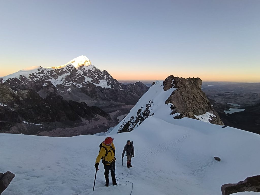 Climber approaching the summit of Jampa Mountain 5,500 m in Peru