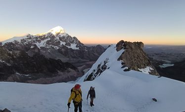 Climber approaching the summit of Jampa Mountain 5,500 m in Peru