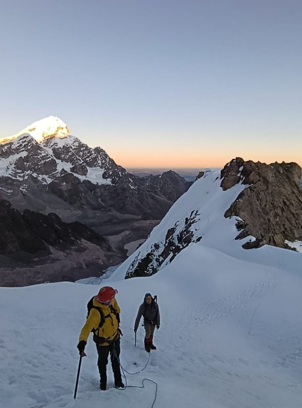 Climber approaching the summit of Jampa Mountain 5,500 m in Peru