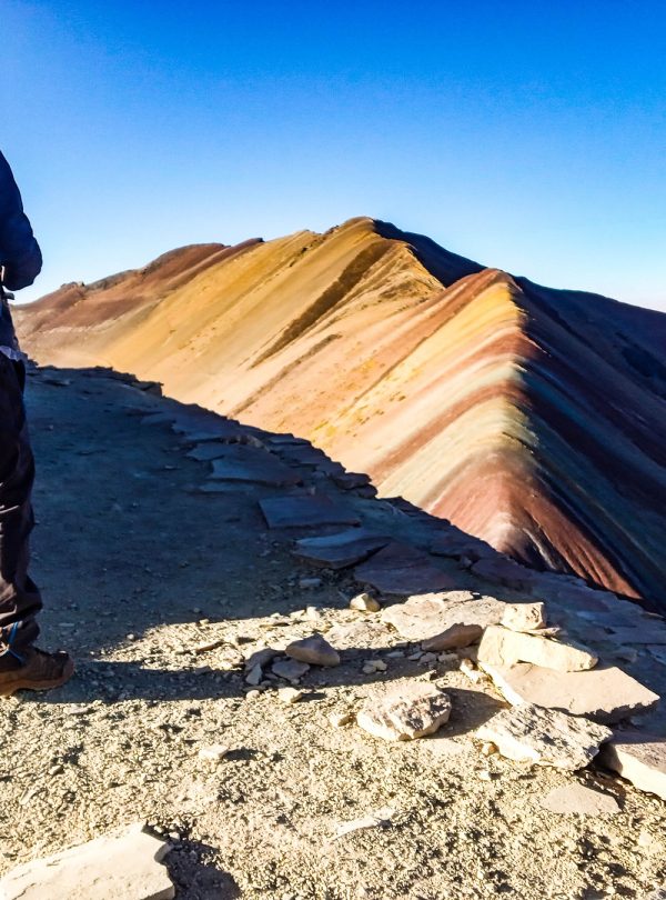 Colorful sunrise over Rainbow Mountain Vinicunca in the Andes of Peru