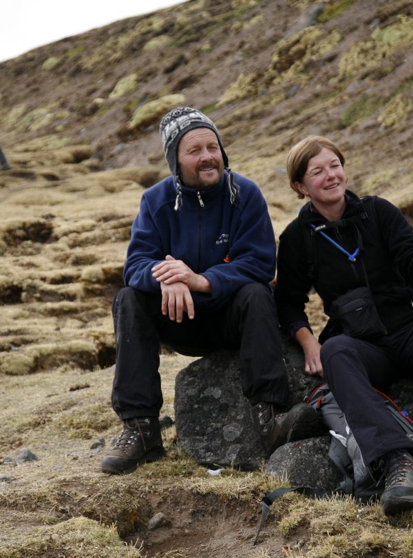 Hikers crossing Killita Pass at 5,233 meters with panoramic Andean views – Ausangate to Sibinacocha Trek