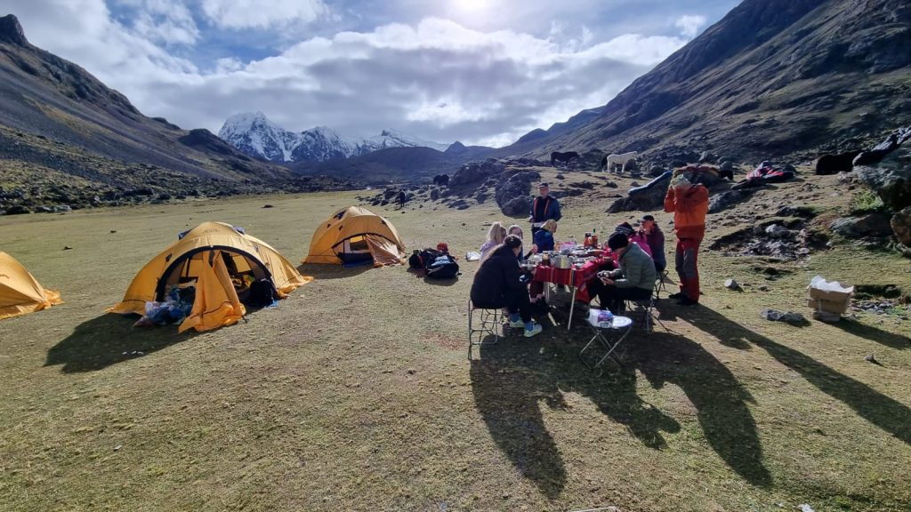 Trekking group camping under the stars on Ausangate route