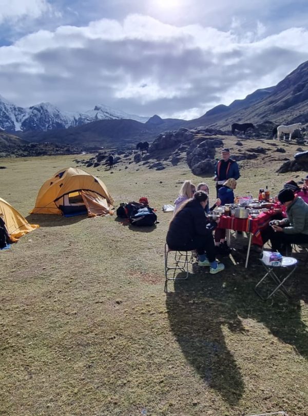 Trekking group camping under the stars on Ausangate route