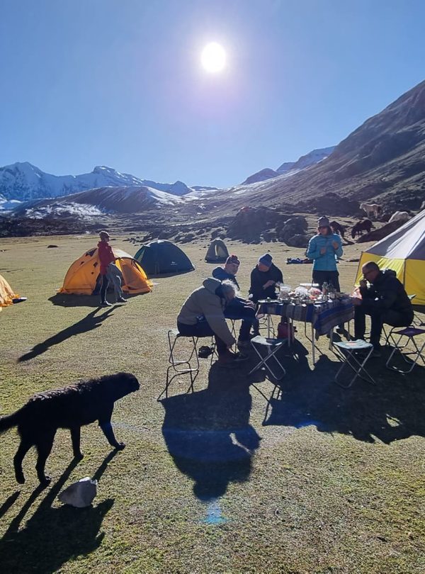 Night view of the Ananta campsite under a starry sky during the Ausangate 2 Day Rainbow Mountain Trek