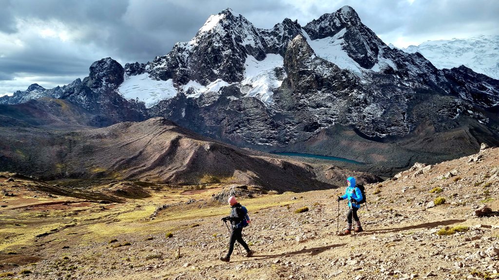 Panoramic view of the Red Valley near Rainbow Mountain Peru with vibrant crimson hills