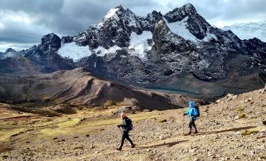 Panoramic view of the Red Valley near Rainbow Mountain Peru with vibrant crimson hills