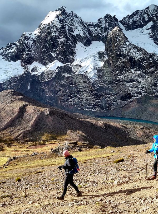 Panoramic view of the Red Valley near Rainbow Mountain Peru with vibrant crimson hills